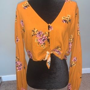 Mustard color blouse with purple flowers